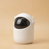 Automatic laser cat toy, matte white visor body, studio packshot